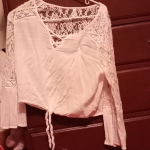 Light cropped shirt.